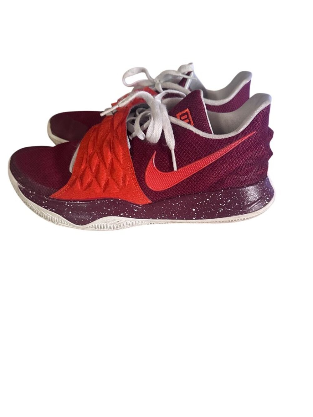 Nike Zoom Kyrie better on the tongue on shoe maroon and red in color size 9.5